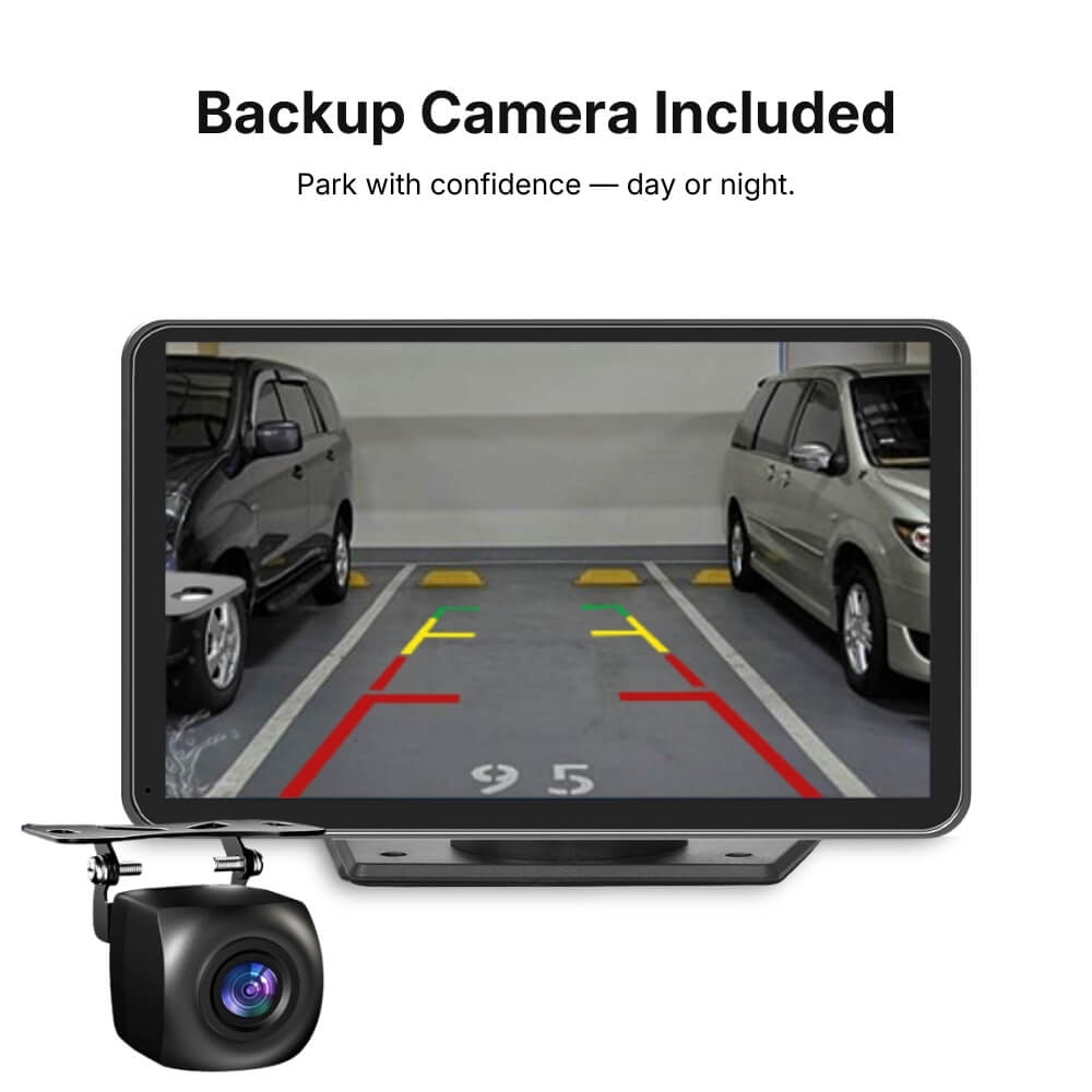 Product image of a black car backup camera system with an external camera unit and its monitor displaying a parking lot view between two vehicles, showing prominent red, yellow, and green parking assist lines, and yellow concrete wheel stops, alongside the text 'Backup Camera Included'