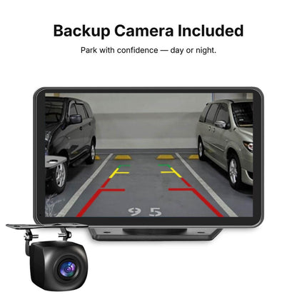 Product image of a black car backup camera system with an external camera unit and its monitor displaying a parking lot view between two vehicles, showing prominent red, yellow, and green parking assist lines, and yellow concrete wheel stops, alongside the text 'Backup Camera Included'