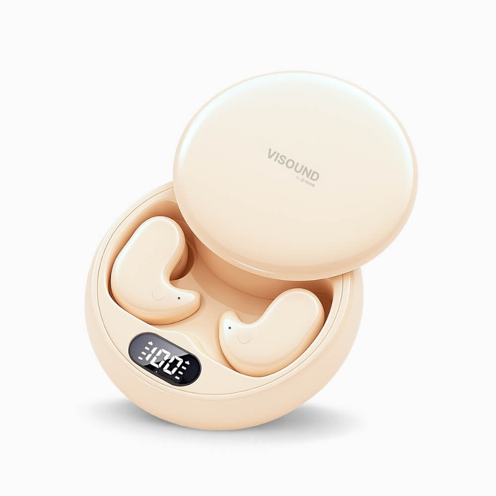VISOUND by O Vone nude wireless earbuds in their open charging case, displaying 100% battery on a digital screen, with ergonomic bean-shaped earbuds featuring tiny dot details, all on a white studio background